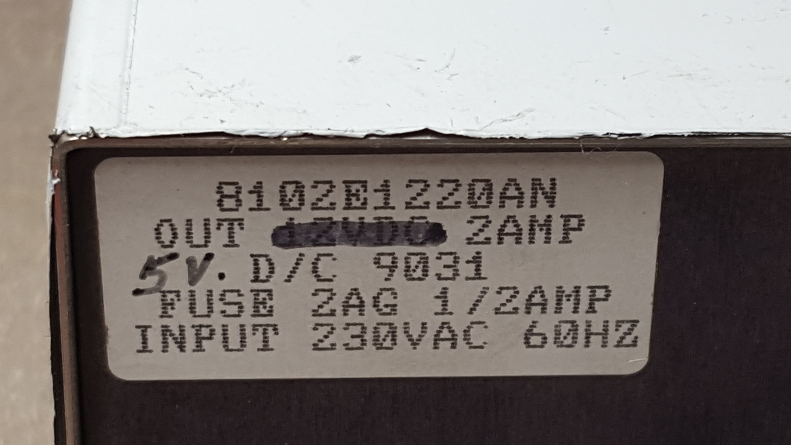 Xenotronix Model 8102E1220AN Battery Charger, Output 5Vdc. Tested with 120Vac.