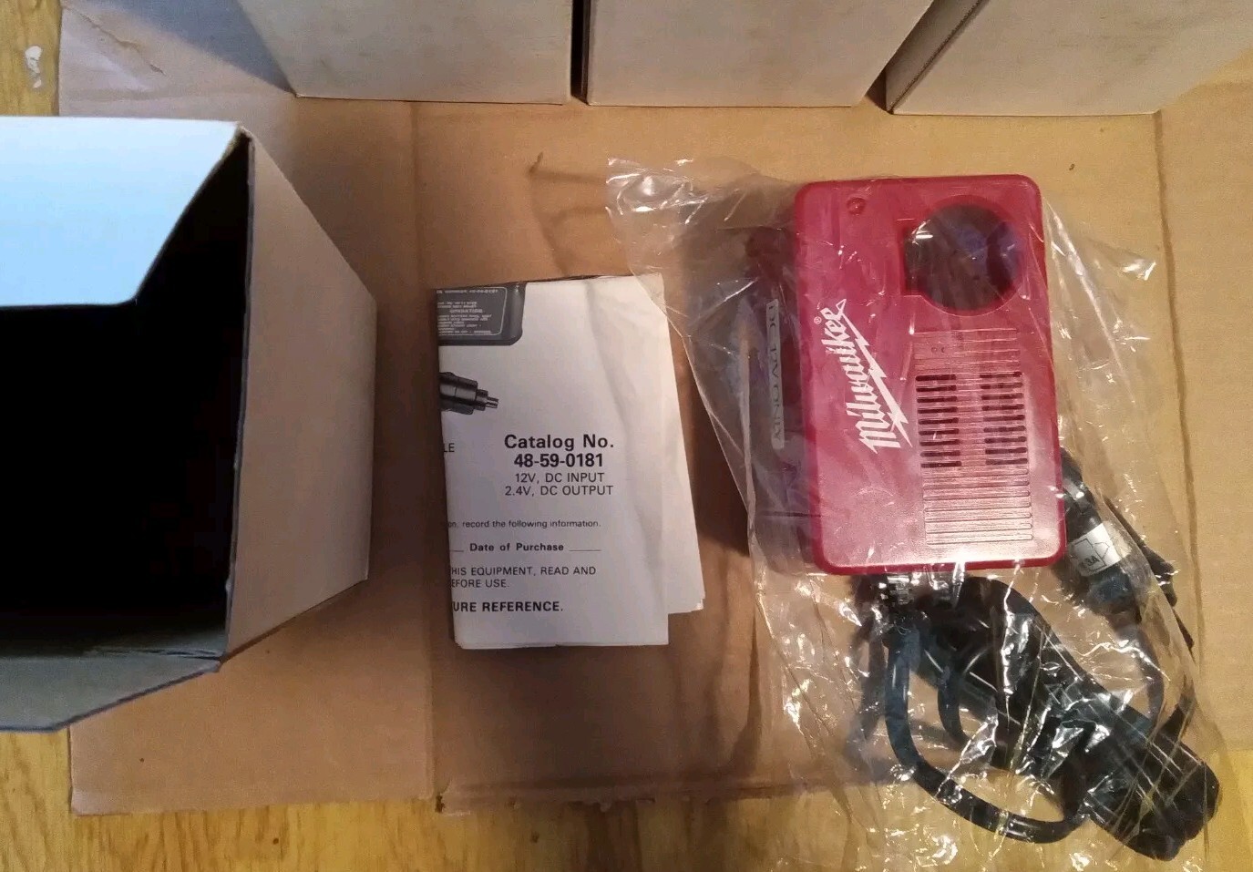 MILWAUKEE NOS BATTERY CHARGER 12V DC 48-59-0181 ** DC PLUG ONLY**