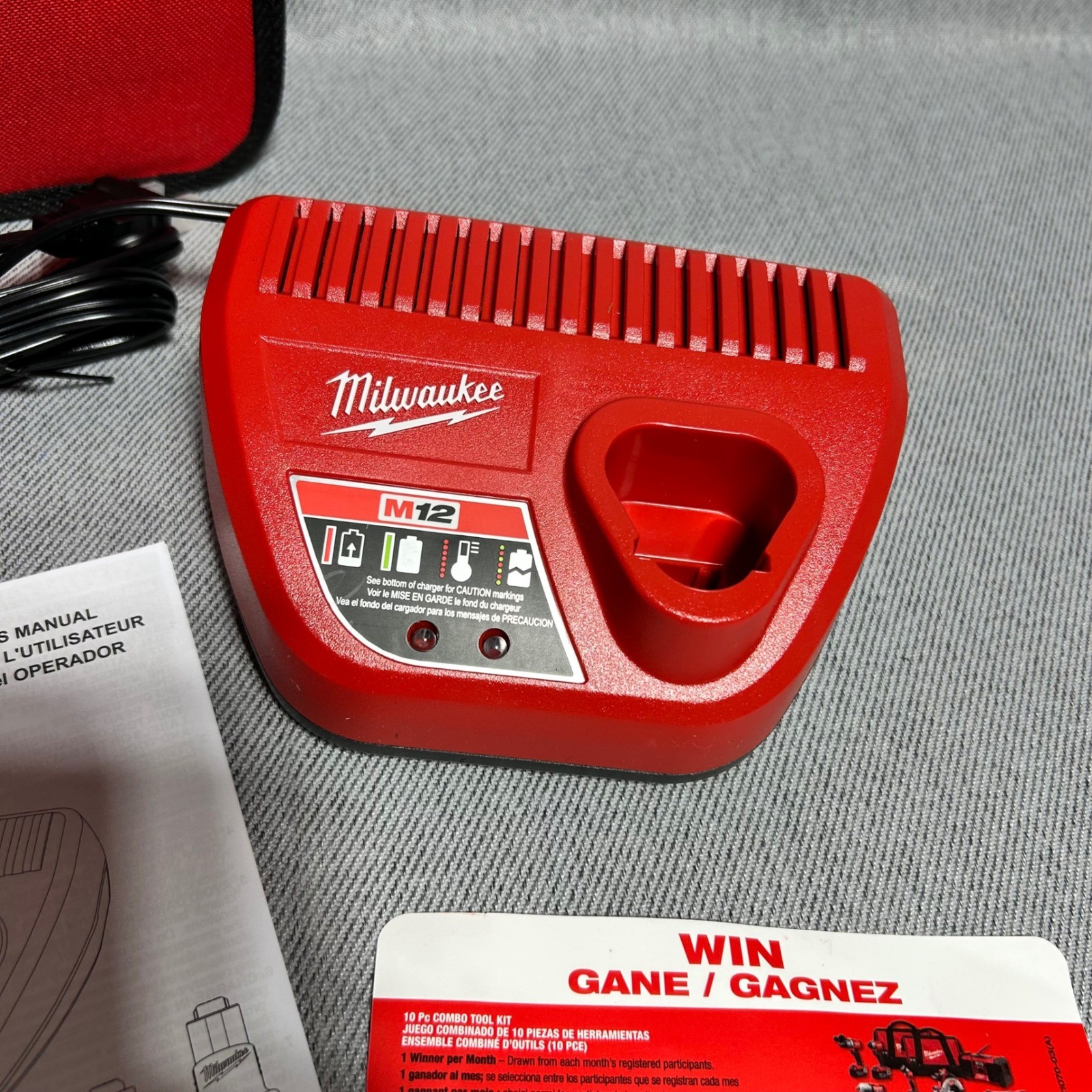 Milwaukee M12 Fuel Charger 48-59-2401 Case and Manuals Red Black