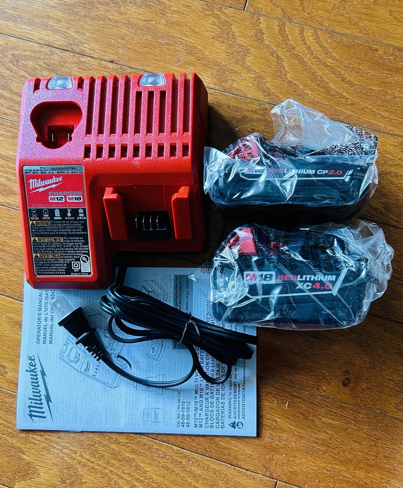 Milwaukee M12/M18 MULTIVOLTAGE CHARGERS and M18 LI-lON BATTERY PACKS