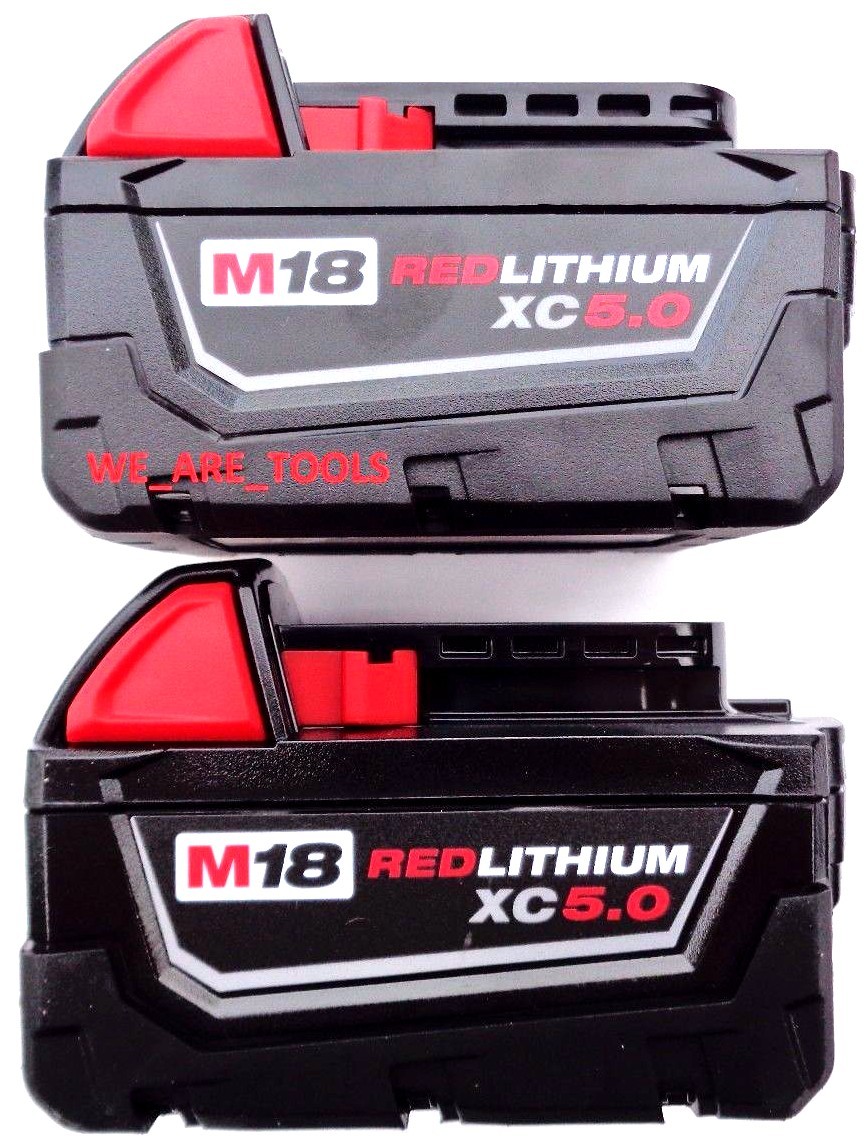 (5) New 18V Milwaukee 48-11-1850 5.0 AH Batteries, (1) Charger, M18 18 Volt Red