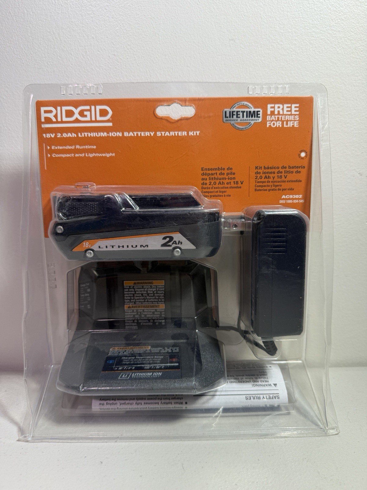 RIDGID 18V 2.0 Ah Lithium-Ion Battery + Charger Starter Kit AC9302