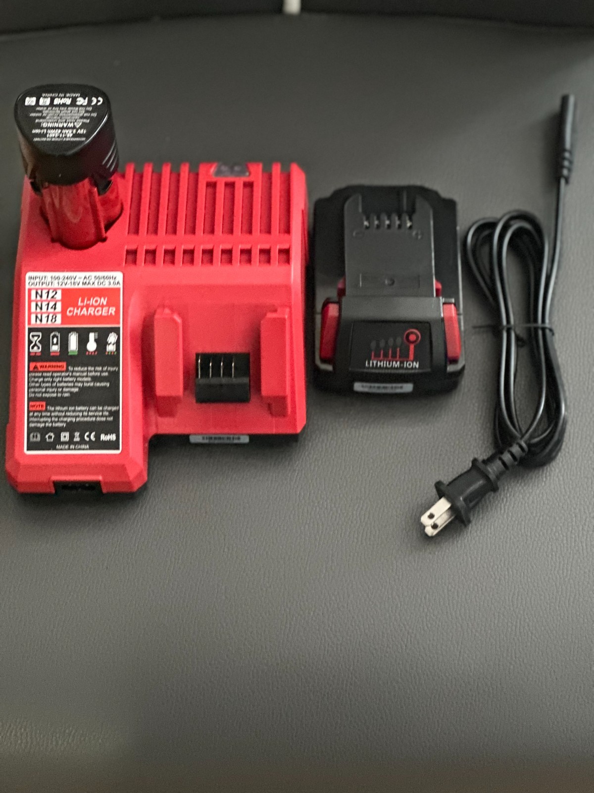 Li-Ion Charger Input: 100-240v-AC50/60HZ Output:12V-18V Max DC 3.0A Combo