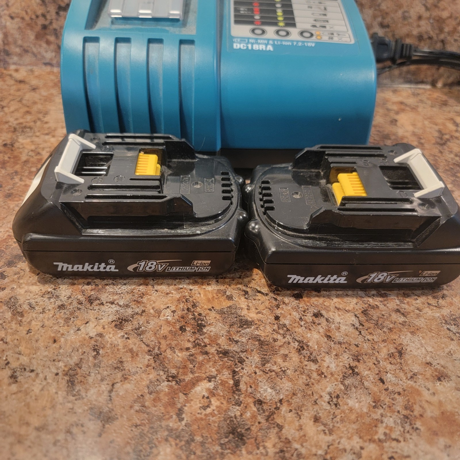 Makita DC18RA 18V Lithium‑Ion Rapid Optimum Charger With Two 18V batteries