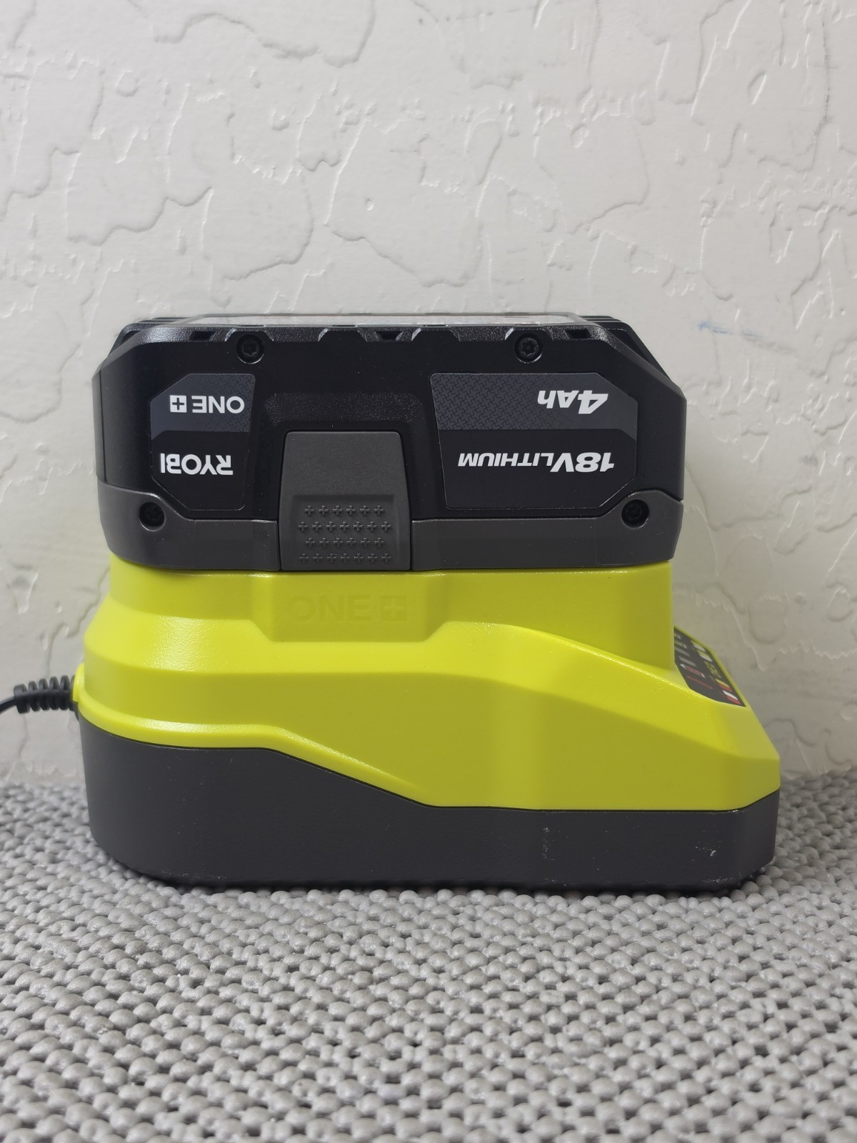 Ryobi PCG002 18V ONE+ Lithium-Ion Charger with Genuine Ryobi PBP005 4Ah Battery