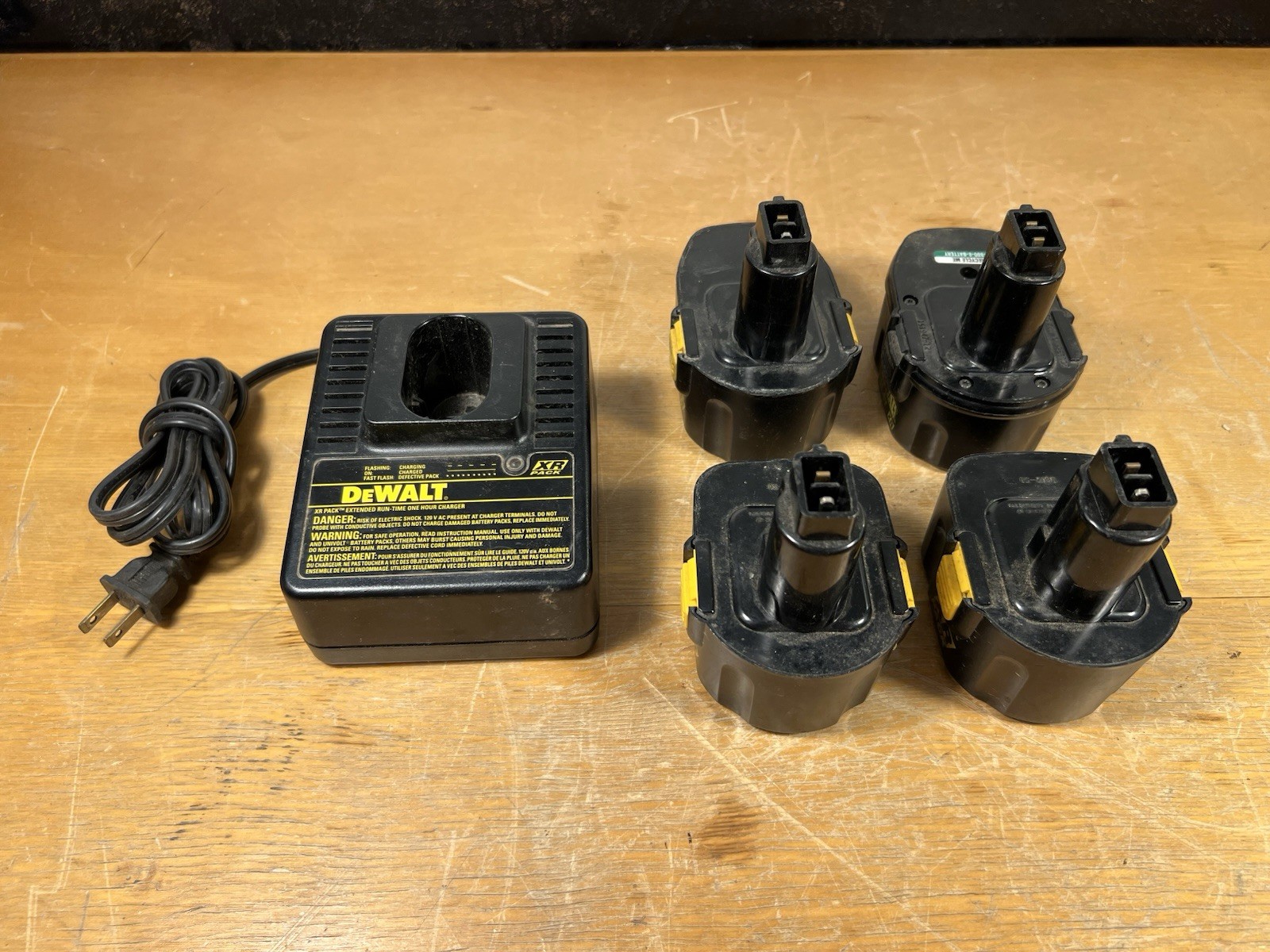 DeWalt DW9106 1-Hr Charger + (4) XR NiCd Batteries 12V & 14.4V – Low Charge