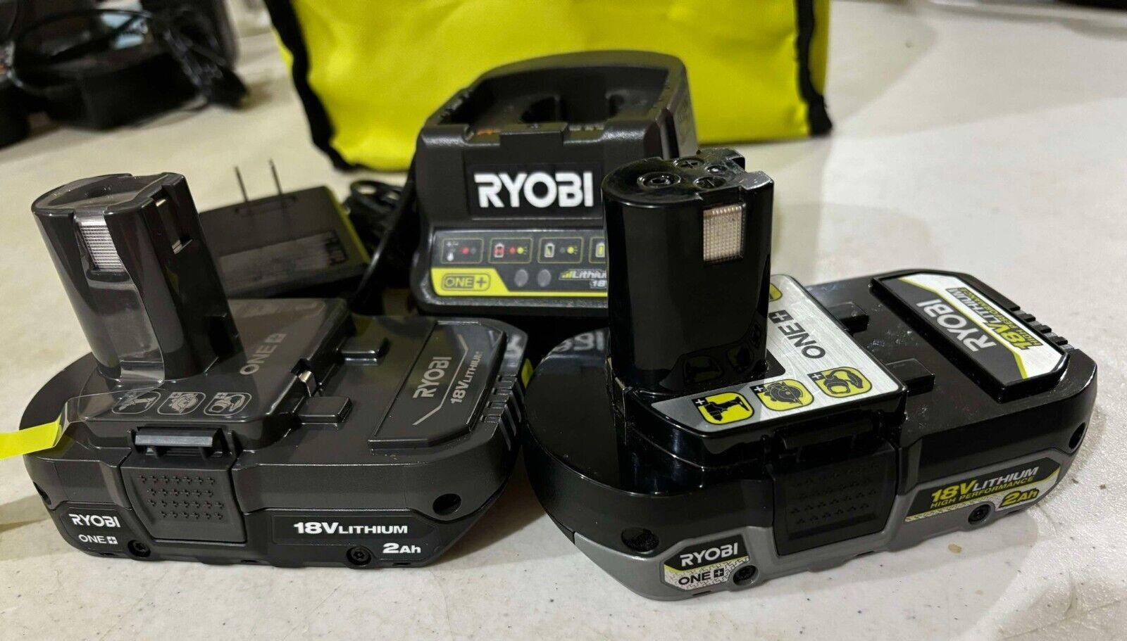 O.B. BUNDLE OF 3- Ryobi Charger 18V Genuine P118B/Battery 2Ah PBP003, PBP006.