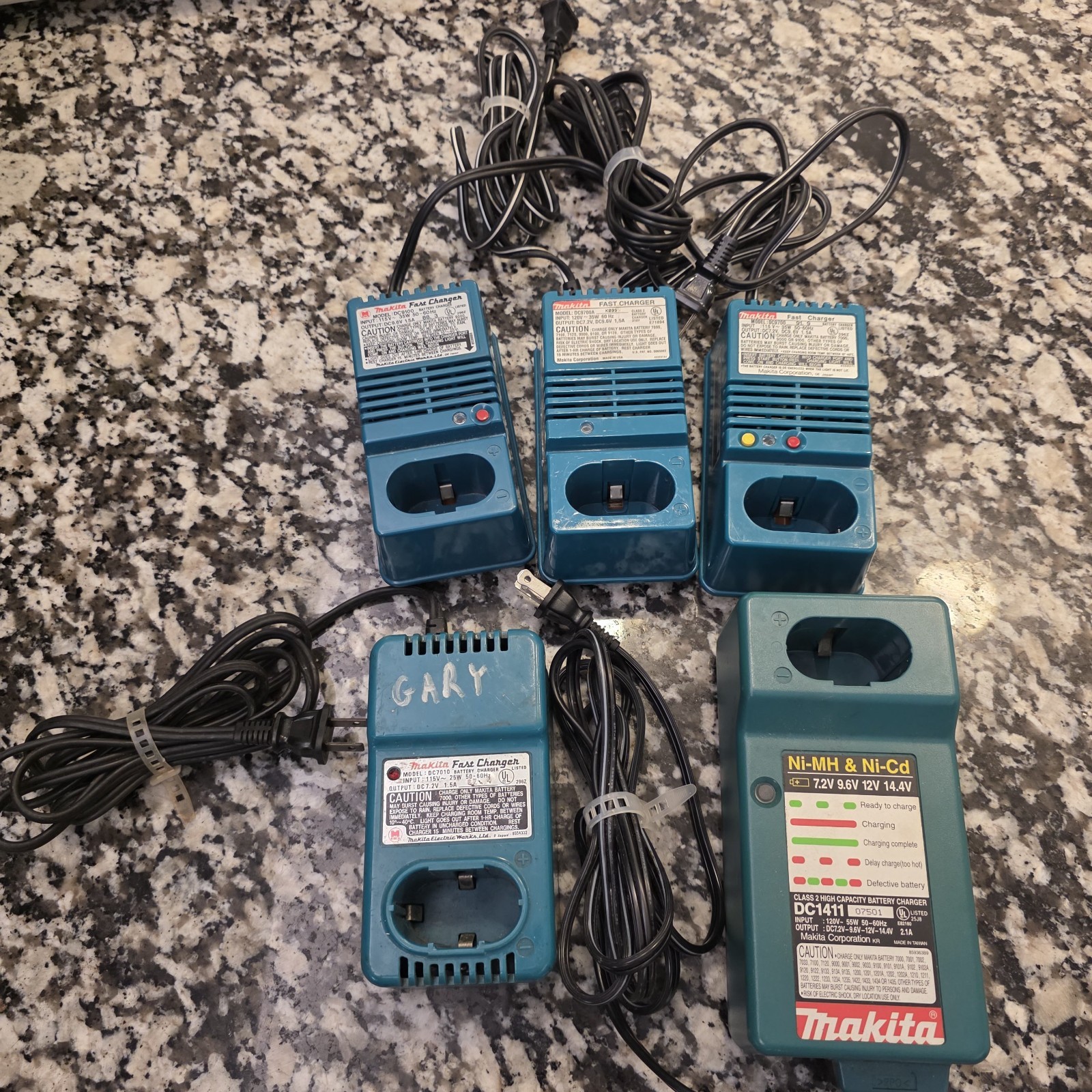 Lot Of 5 – Makita 9.6v Chargers. Untested DC1411 DC7010 DC9100 DC9700A